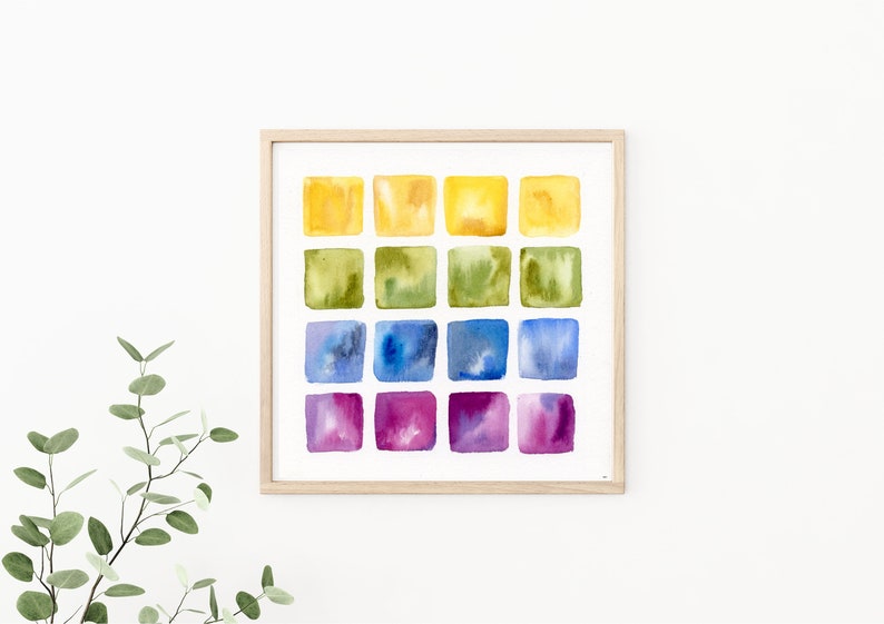 K&ouml;nnte beinhalten: Ein gerahmtes Aquarellbild mit einem Raster aus 16 Quadraten. Die Quadrate sind in Gelb-, Gr&uuml;n-, Blau- und Violettt&ouml;nen bemalt.