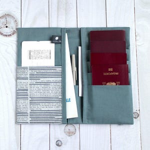 Reisdocumenthouder, familiepaspoortzakje, vliegticketset, reisorganisator