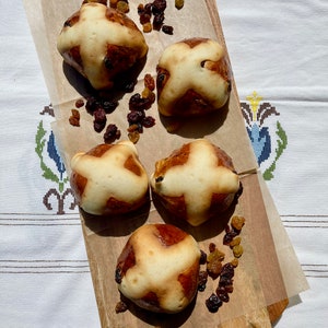 May include: A handmade wooden sign with the text "Welcome" in a playful font. The sign features a distressed white background and a dark brown frame, perfect for a front door or entryway.