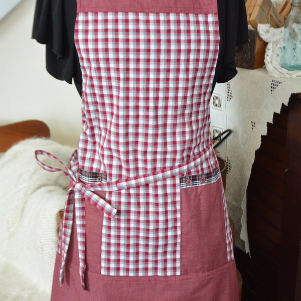 Upcycled shirt apron.  Kitchen apron made with 2 repurposed men's dress shirts featuring crisscross back and front pockets, Burgundy check