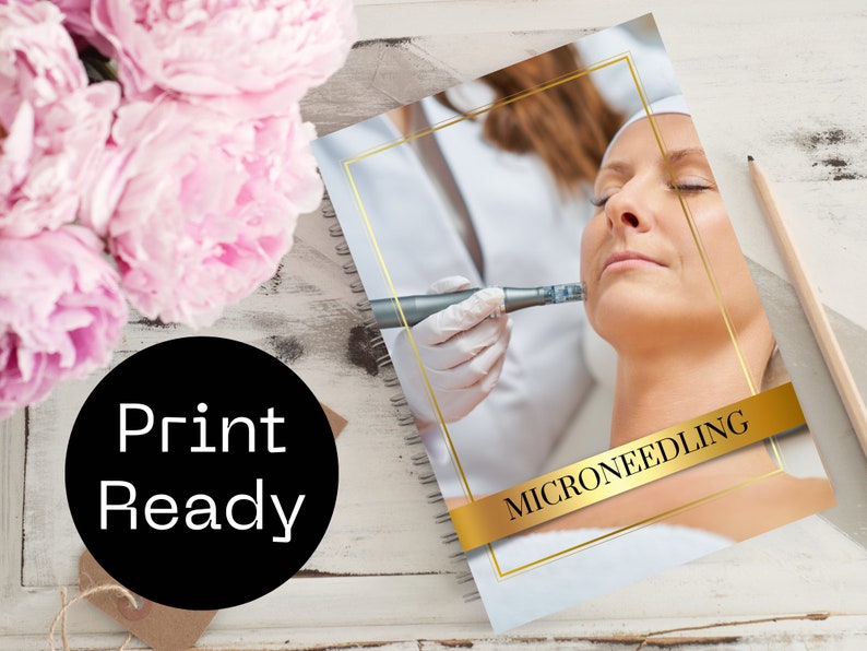 May include: A white and gold notebook with a photo of a person receiving a microneedling treatment. The notebook has the text "MICRONEEDLING" on the cover.