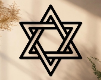 May include: A black and white Star of David, also known as the Magen David, is a six-pointed star symbol. The star is made of two overlapping equilateral triangles.