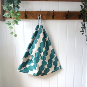 Origami Bag in Bobbin Shaped Pattern Print in Teal Green and Oatmeal Beige Background  and Sturdy Pale Mint Green Canvas Handle