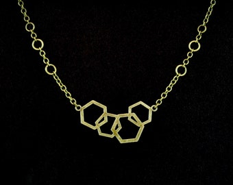 Hexagon charm necklace, antique brass necklace, bee hive charm, hexagon jewelry, geometric charm jewelry, hexagon charm on decorative chain