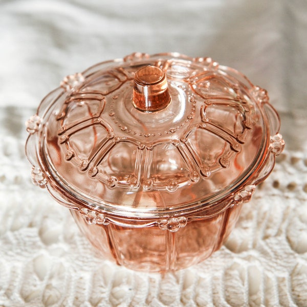 Sucrier ancien en verre rose moulé