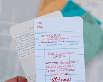May include: A white library card with red text. The card has the title "The Unselected Journals of Emma M. Lion, Vol. 4" and the author "Brower, Beth". The card also has a quote: "What do you make of this? ...Pierce shrugged. Islington waited. It was Hawkes who gave voice. "Alchemy."