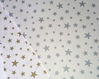 White Vellum A4 sheets decorated with  gold stars