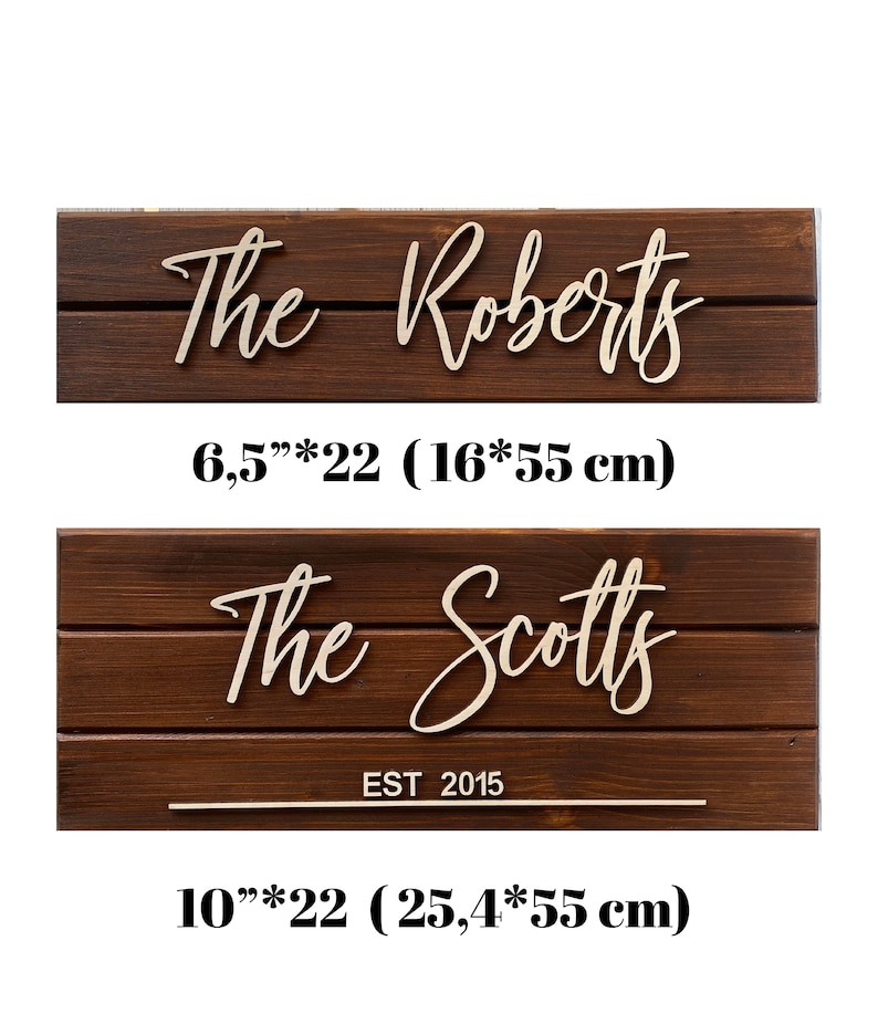May include: Two wooden signs with the names "The Roberts" and "The Scotts EST 2015" in cursive script. The signs are 6.5 inches by 22 inches and 10 inches by 22 inches.