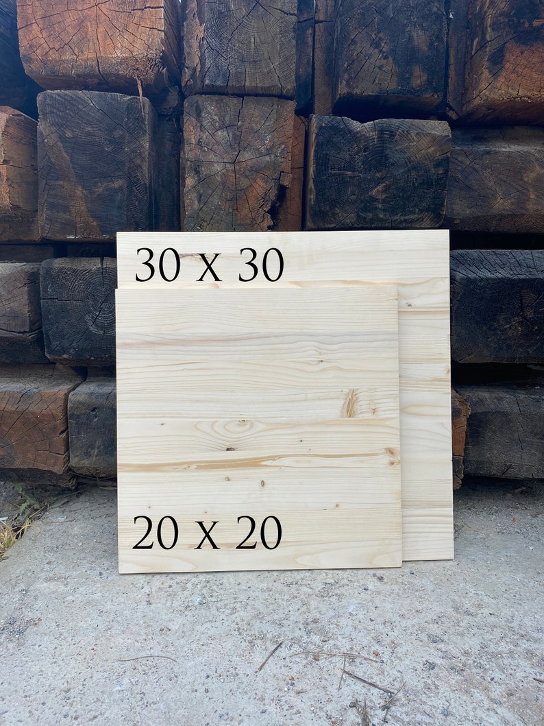 May include: Two wooden boards, one measuring 30 x 30 inches and the other 20 x 20 inches. The boards are light brown and have a natural wood grain.