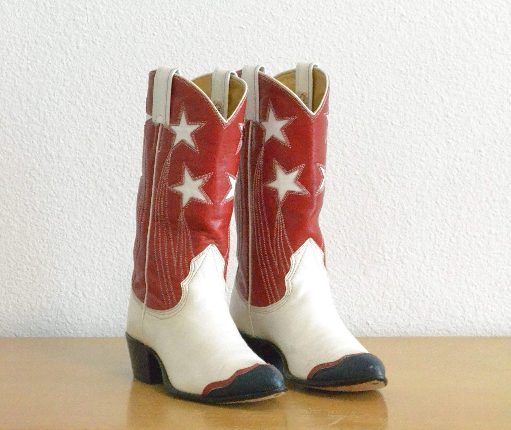 white and blue cowboy boots