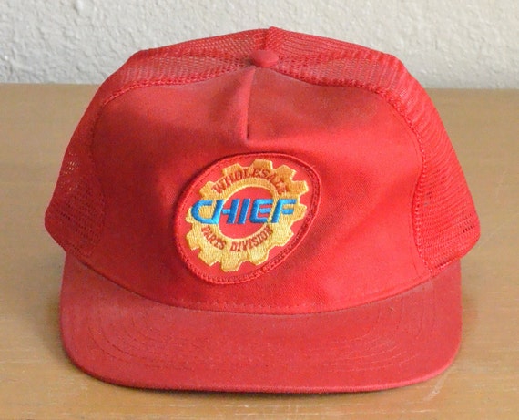 designer patched trucker hat — reworked vintage clothing and much more!
