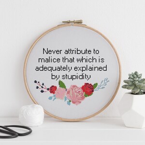 Never attribute to malice that which is adequately explained by stupidity counted cross stitch xstitch funny Insult pattern pdf image 2