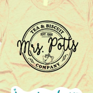 May include: A yellow t-shirt with a black circle design that says "TEA & BISCUIT EST. 1991 Mrs. Potts COMPANY". The design is on a beige t-shirt. The text "Jenny Lynn West SVG" is in blue and white on the bottom of the shirt.