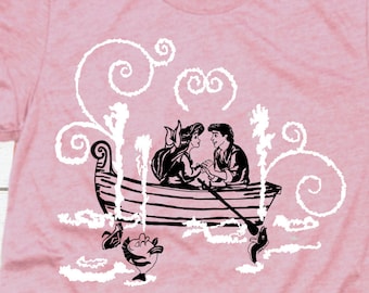 May include: A pink t-shirt with a black and white illustration of Ariel and Prince Eric in a boat. The illustration is surrounded by white swirls. The text "Jennylyn West SVG" is at the bottom of the shirt.
