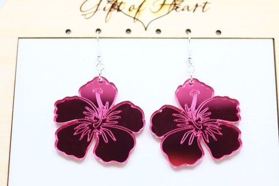 cute laser cut pastel pink acrylic flower earrings. YOU GROW GIRL