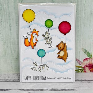 Handmade Birthday card with cute balloons made with Lawn Fawn stamps and dies. Great for adults or kids.