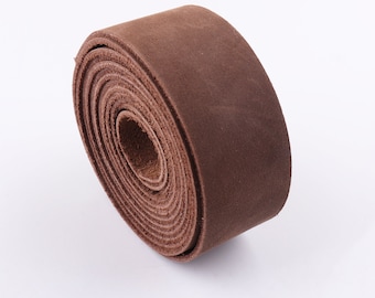 May include: A roll of brown leather strap, perfect for crafting projects.