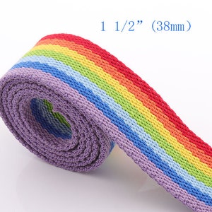 May include: Rainbow woven webbing with a purple edge. The webbing is 1 1/2 inches (38 mm) wide.