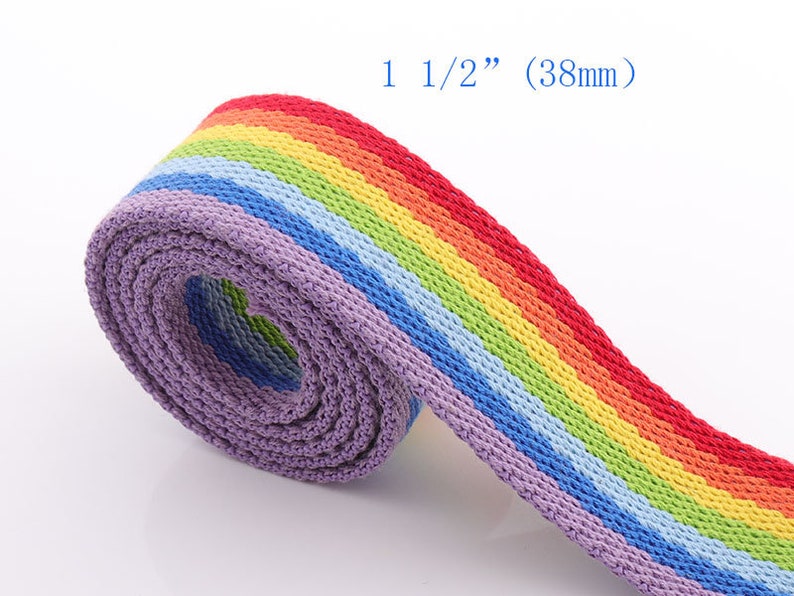 May include: Rainbow woven webbing with a purple edge. The webbing is 1 1/2 inches (38 mm) wide.