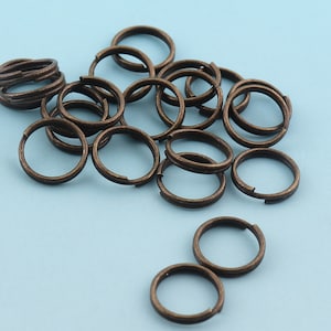 Anillo dividido 100pcs 10mm Mini llavero bronce O anillo llavero fob anillo de metal de salto para llavero al por mayor Key Ring Hallazgos