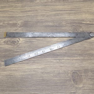 Vintage 24" J. Rabone & Sons, Birmingham nr. 1638 opvouwbare stalen meetlat - imperiale schaal