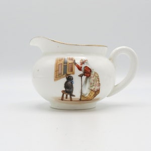 Charming Antique Royal Doulton ‘Old Mother Hubbard’ Nursery Rhyme Porcelain Milk Jug