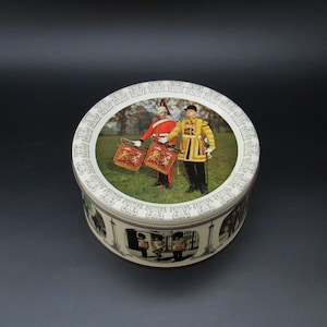 Scarce Vintage  5.5” Mackintosh’s Quality Street Toffees & Chocolates Tin Featuring Royal Guards. 1960s