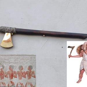 Ancient Egyptian ax.Ancient ax head. copy