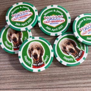 May include: Six green and white poker chips with a dog image and the text "Happily ever after party!" and "Welcome to the Fabulous Caley-Brannigan Wedding 26th April 2025" printed on them.