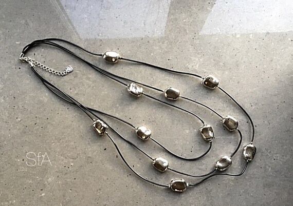 Lagenlook quirky, multi thread cubed pebbles, on long coated cord thread, with extension chain.