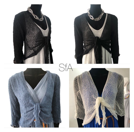 Belero or shrug,in net knit, perfect as a cover up. Size medium to large