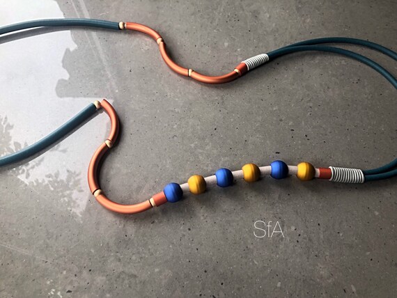 Rubber long necklace, lagenlook statement. Grey and teal threads with copper pipes and rainbow beads