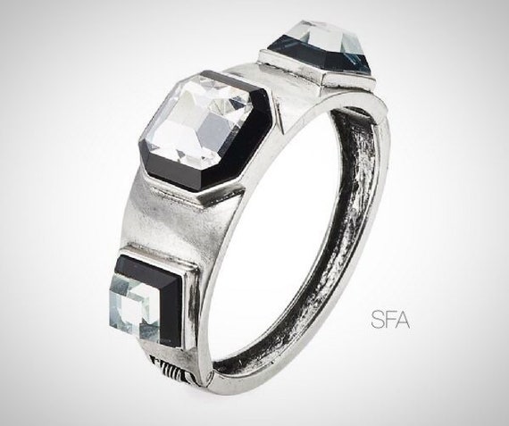 The Holly bangle. Chunky silver tone lage glass stones. With hinge fastener.