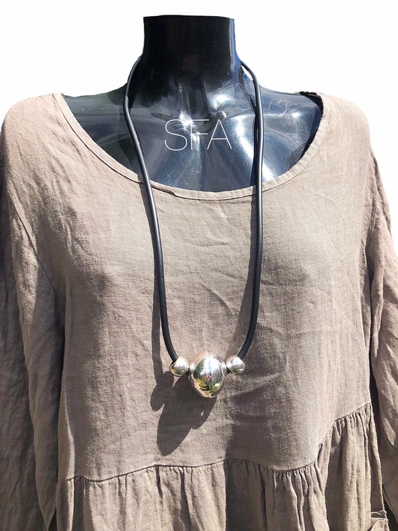 Lagenlook large bauble pendant with smaller balls either side, on thick rubber necklace