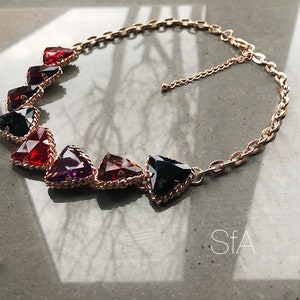 Chain necklace, glass triangle crystals.