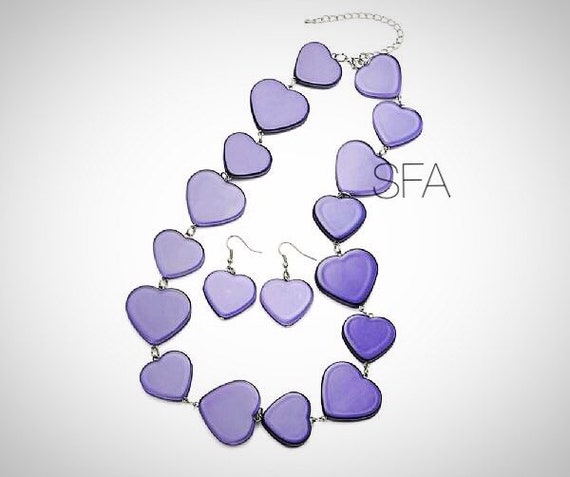 The Lila deap violet or vintage green acrylic heart earrings and necklace.