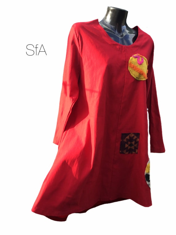 Lagenlook tunic, with fluffy, furry, applique designed. Size, 12, 14, 16, 18. Super stretchy. Size 2XL