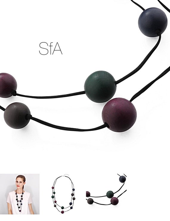 Lagenlook, double row wooden balls, in green and purple, faux suede, rubber strands.