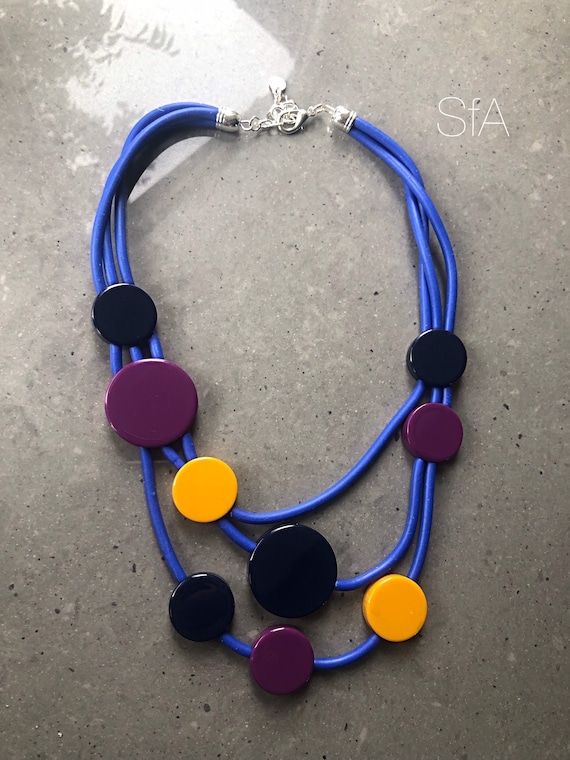 Rubber necklace, electric blue multi strand, with acrylic polished discs.