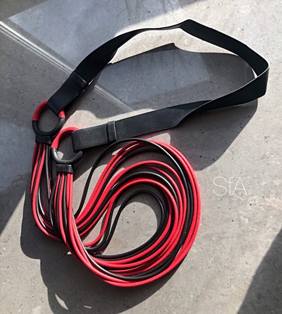 Rubber necklace, multi thread, in red and black. Quirky, statement piece.