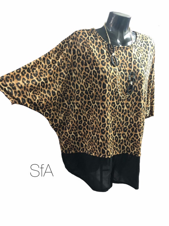 Leopard print tunic top, with shear black trim and free necklace