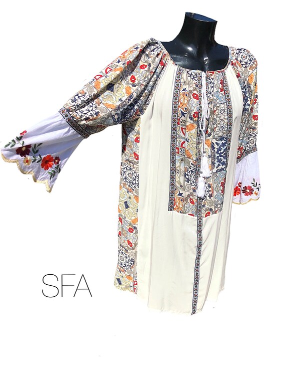 hippy chic tunic with embriodered sleeves. One size fits all. Size 10, 12, 14, 16, 18, 20