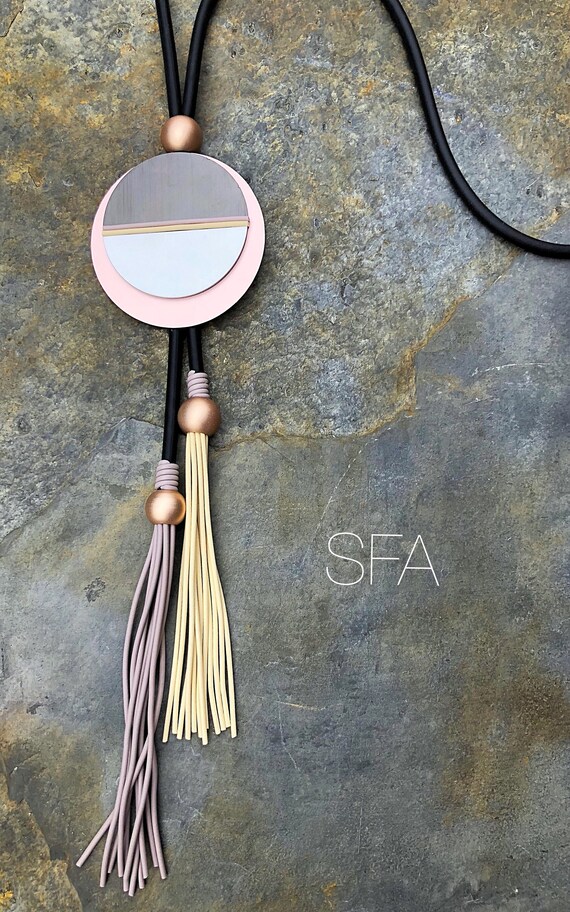 Fabulous lagenlook long rubber tassel necklace, in 2 different colours with 2 tone discs.