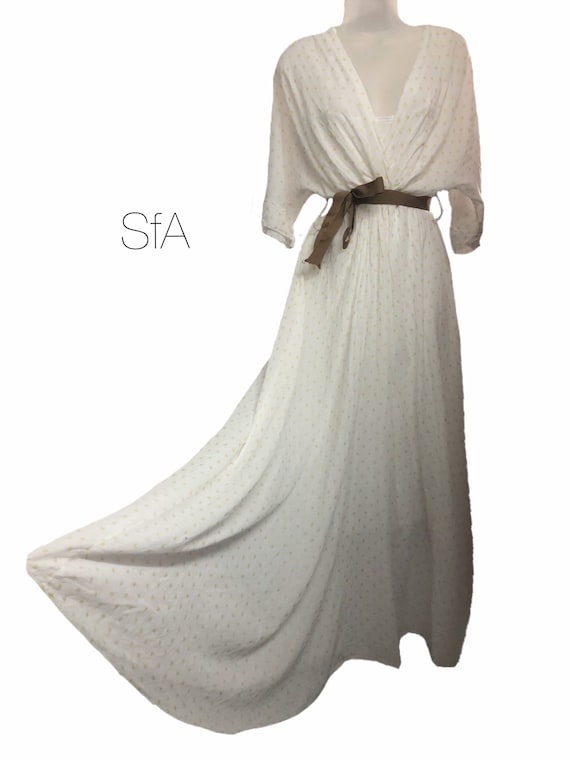 Cotton star maxi dress with full petty coat linning, available in 4 colours. Size 8-12 uk