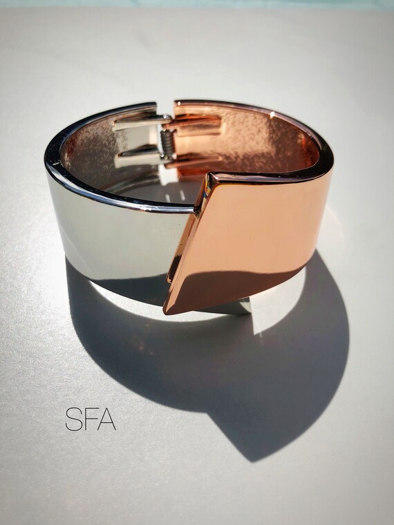 Abstract geo, bangle cuff, in 2 tone metal, silver and gold with hinged opening.
