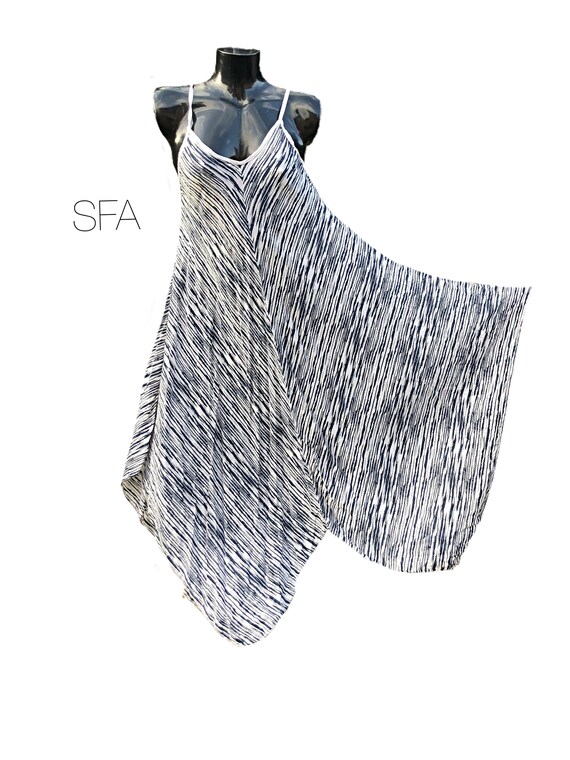 Strappy sundress, with handkerchief hem. One size reg, 12 14, 16, 18. 5 colours