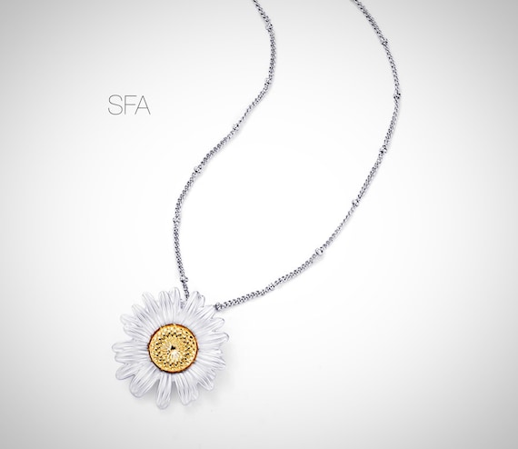 Sunning daisy necklace in frosted silver or frosted deep coral, rose gold. With co-ordinating chain.