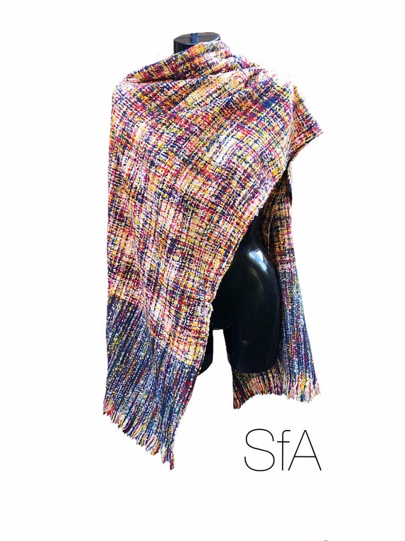 Multi coloured loose weave long scarf. With tassels, very soft, made from acrylic.