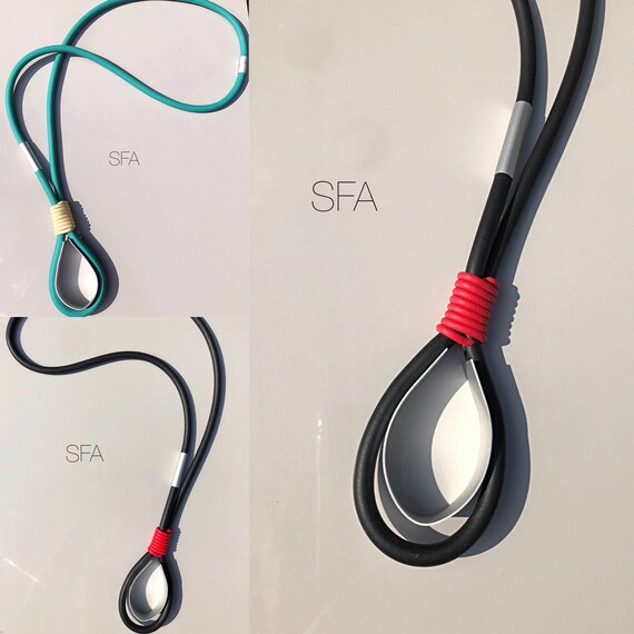 New season, lagenlook black and red or teal and cream necklace. With frosted silver tubes.