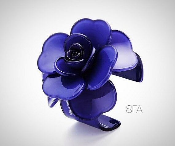 Stunning Maria acrylic statement piece, flower bangle in indego blue, expandable.